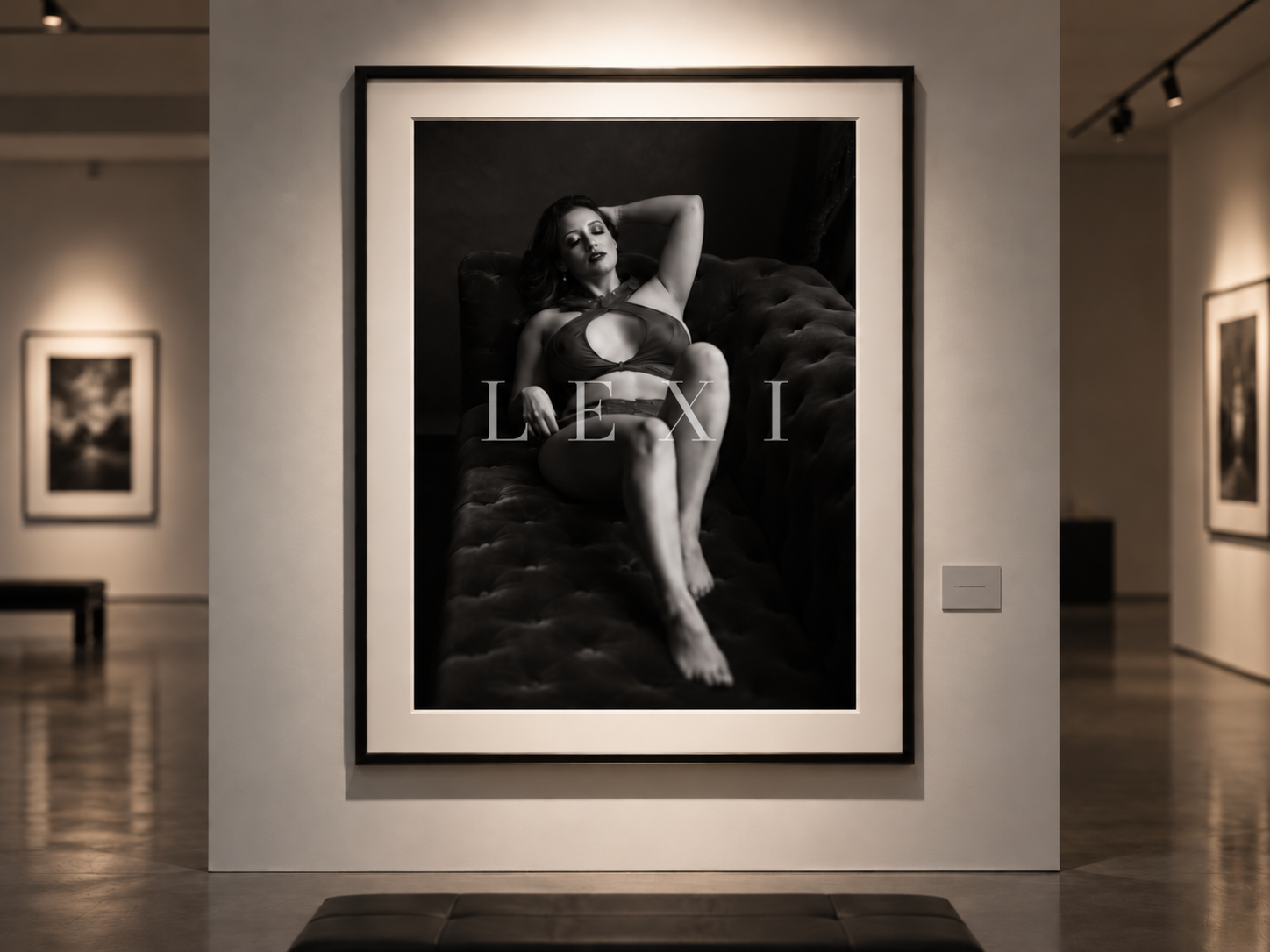 Framed print from After Dark hung under warm gallery lighting